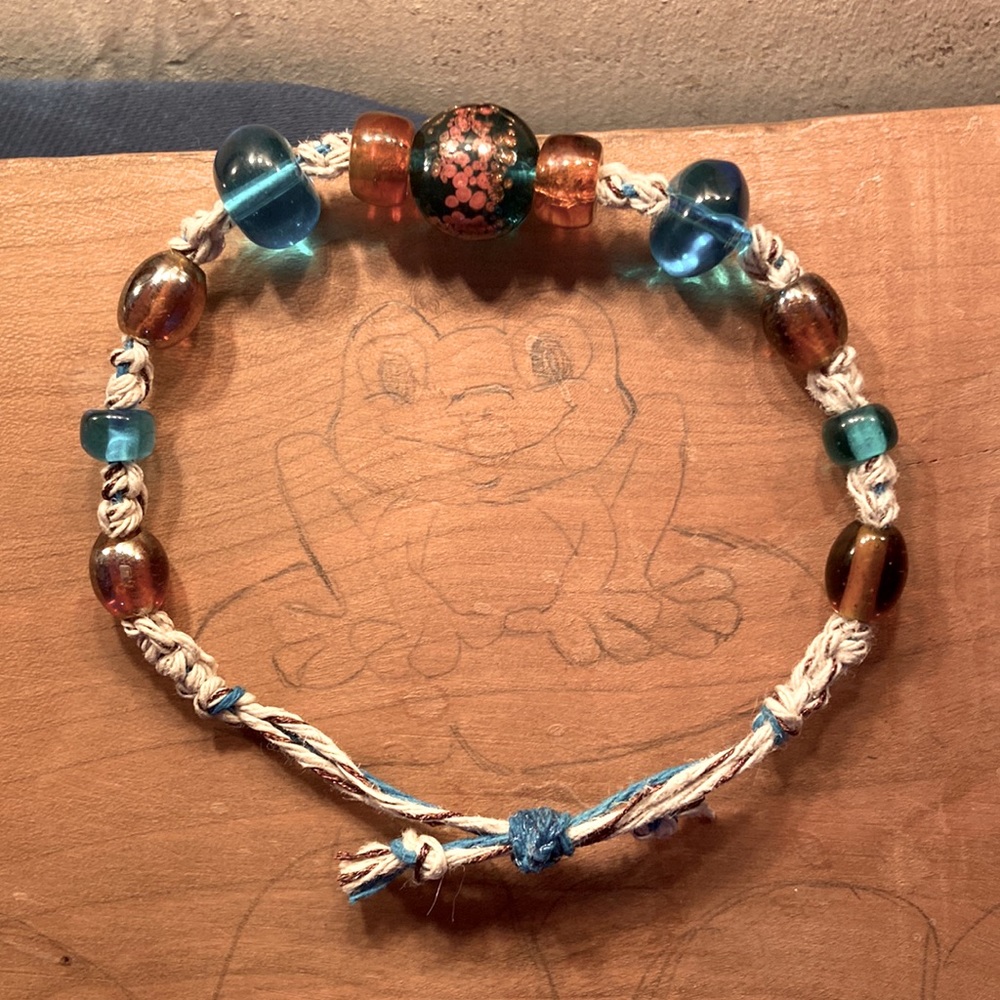 Bracelet is made with hemp has glass beads